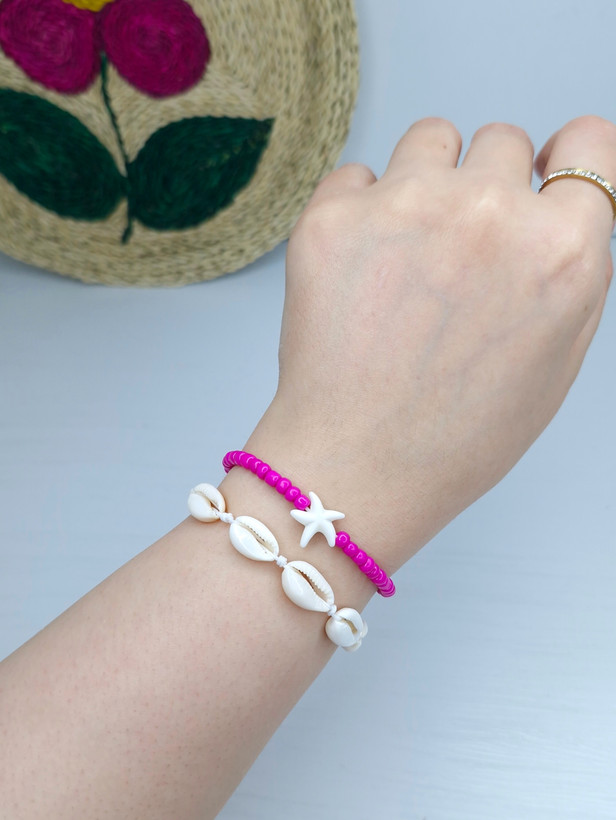 دستبند صدفی و ستارهای صورتی نخی